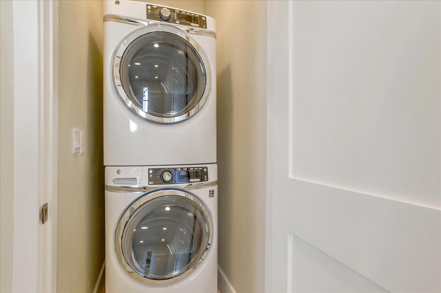 402 Neves Road San Mateo, CA 94403 - Photo 27 of 31 a close up view of a washer and dryer