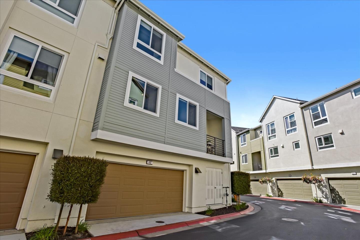 402 Neves Road San Mateo, CA 94403 - Photo 31 of 31 a front view of a house with a street
