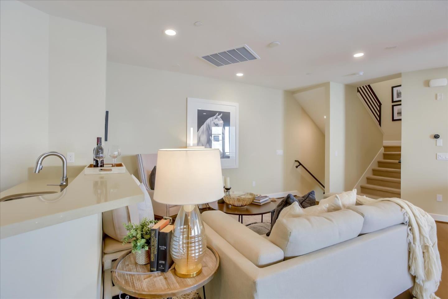 402 Neves Road San Mateo, CA 94403 - Photo 5 of 31 a living room with furniture and a sink