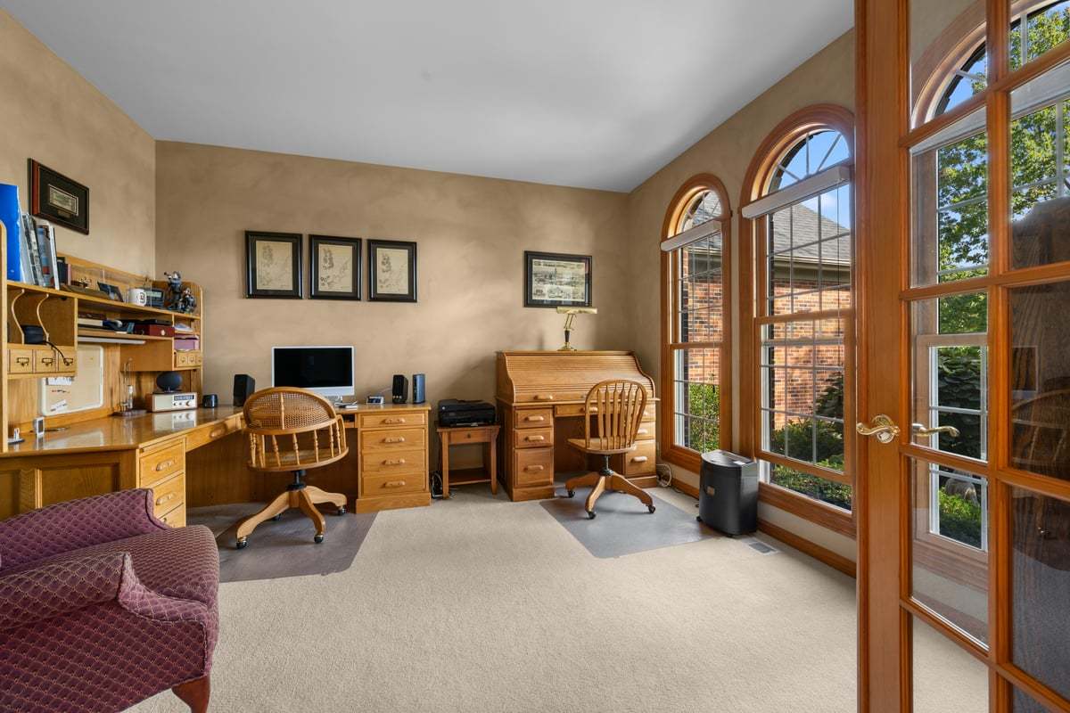 36W824 Red Gate Court St. Charles, IL 60175 - Photo 15 of 39 a view of a livingroom with workspace and a couch