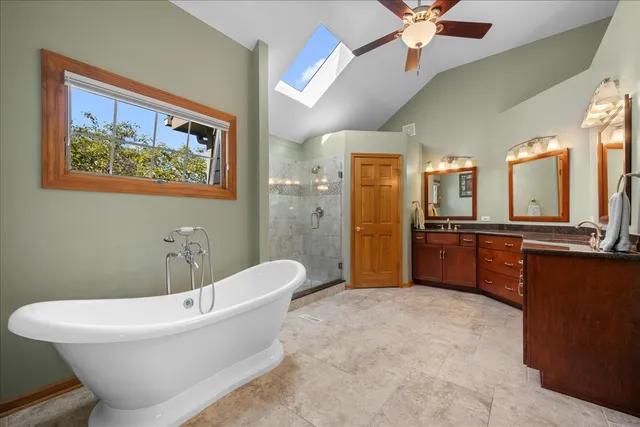 a bathroom with a bathtub and a sink