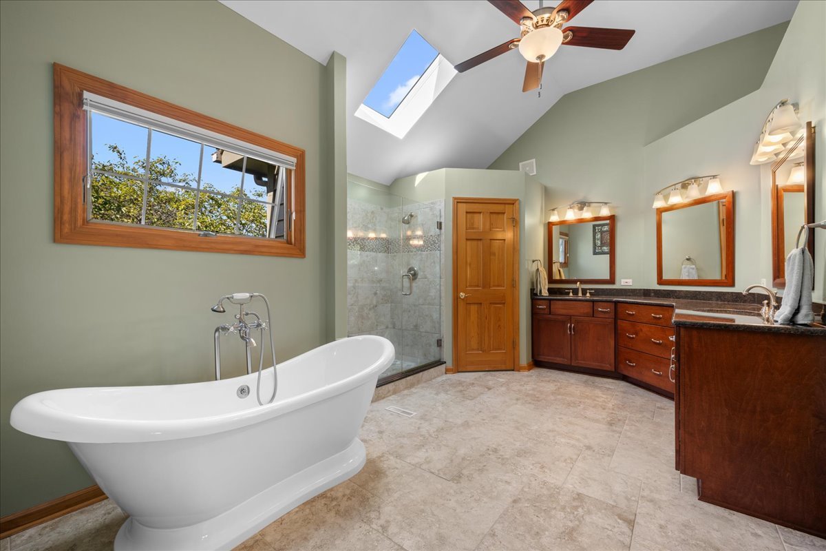36W824 Red Gate Court St. Charles, IL 60175 - Photo 21 of 39 a bathroom with a bathtub and a sink
