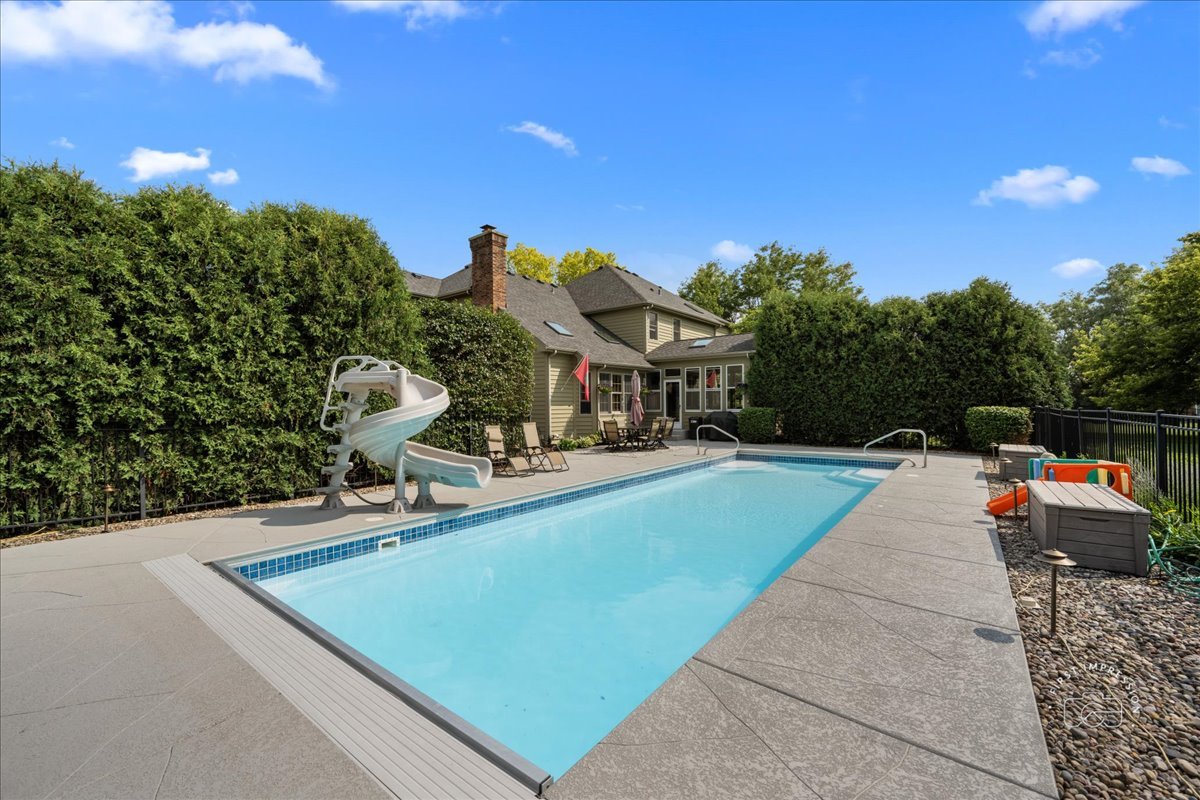 36W824 Red Gate Court St. Charles, IL 60175 - Photo 39 of 39 a view of a swimming pool and lounge chairs