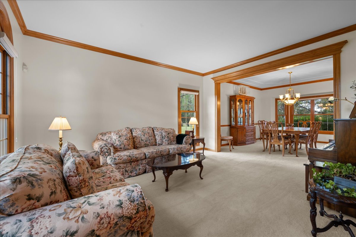 36W824 Red Gate Court St. Charles, IL 60175 - Photo 6 of 39 a living room with furniture and a large window