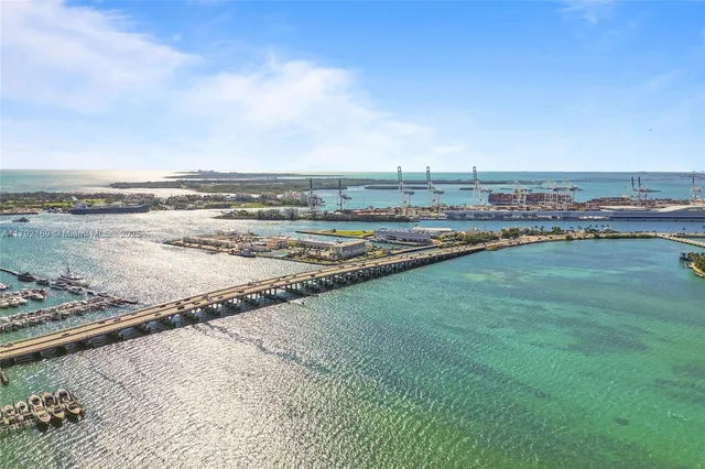 a view of an ocean and city