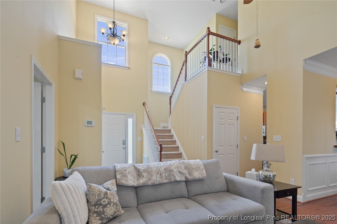 15 London Way Spring Lake, NC 28390 - Photo 14 of 46 a living room with furniture and a stairs