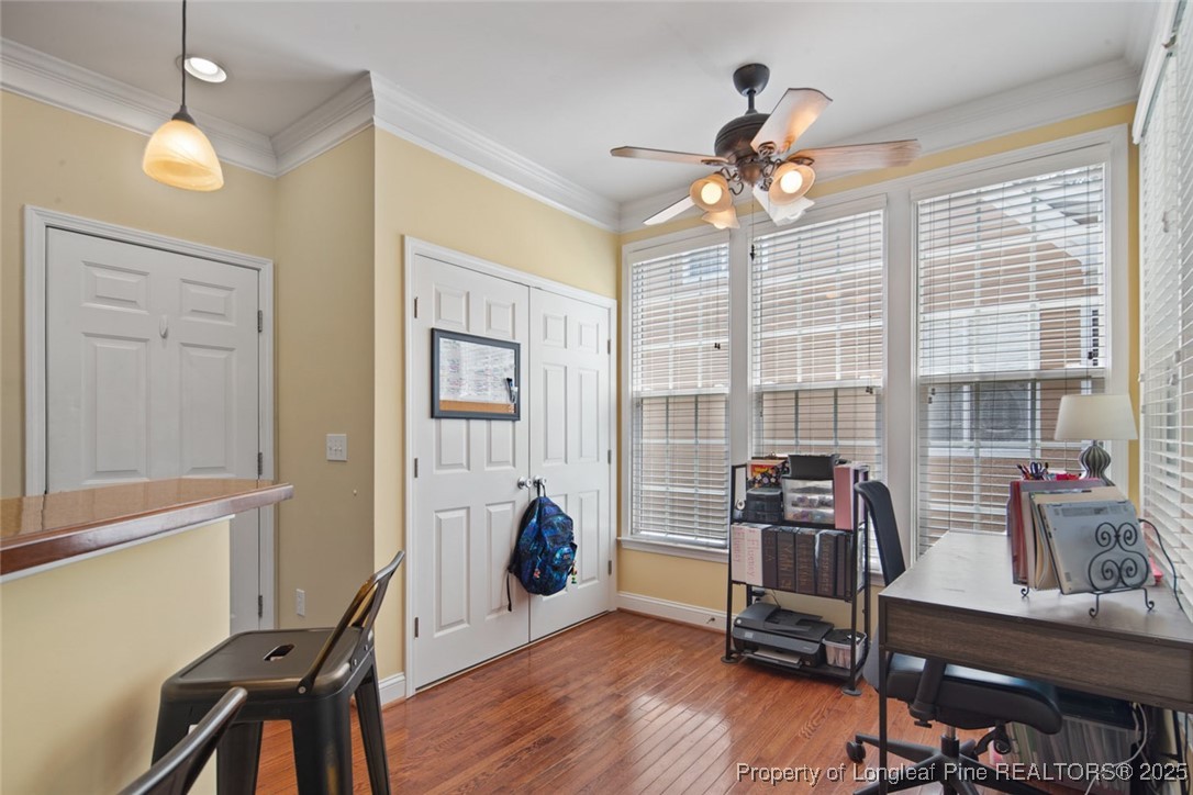 15 London Way Spring Lake, NC 28390 - Photo 17 of 46 a view of a workspace with furniture and a window