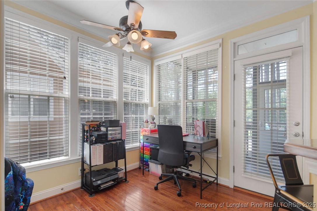 15 London Way Spring Lake, NC 28390 - Photo 18 of 46 a view of a workspace with furniture and a window
