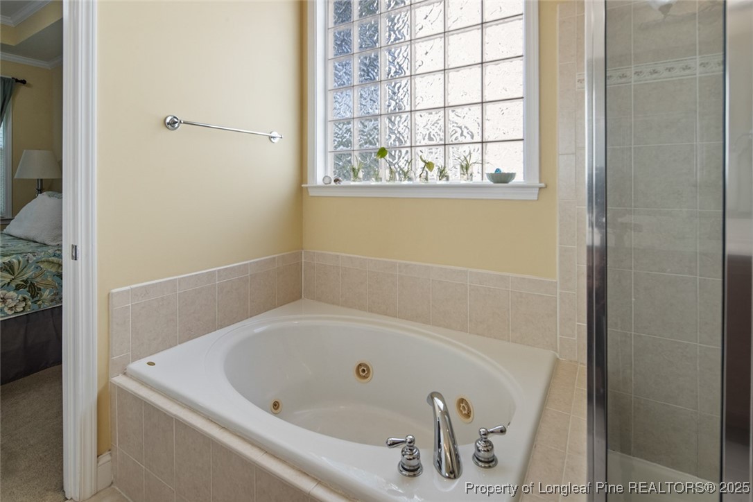 15 London Way Spring Lake, NC 28390 - Photo 30 of 46 a bathroom with a bathtub