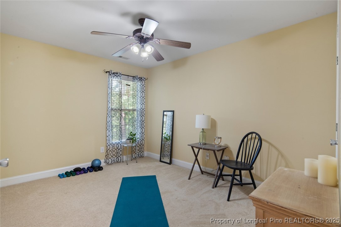 15 London Way Spring Lake, NC 28390 - Photo 38 of 46 a view of a room with furniture and wooden floor