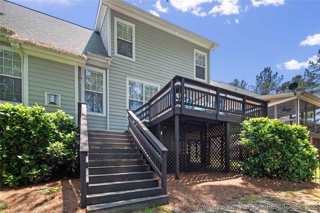 15 London Way Spring Lake, NC 28390 - Photo 44 of 46 a view of a house with entryway and wooden stairs