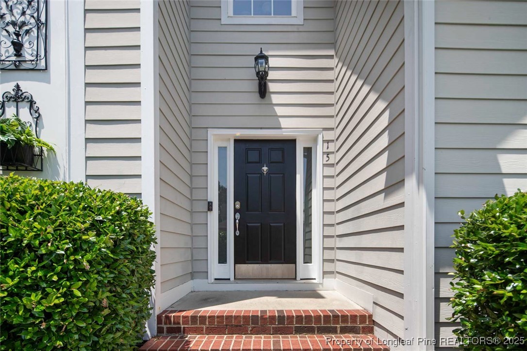 15 London Way Spring Lake, NC 28390 - Photo 8 of 46 a view of entryway with a yard