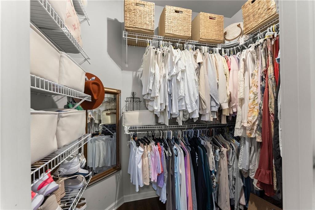 2195 East Maddox Road Buford, GA 30519 - Photo 20 of 100 a view of walk in closet with clothes