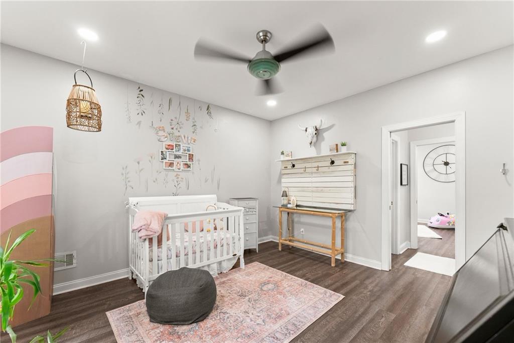 2195 East Maddox Road Buford, GA 30519 - Photo 33 of 100 a room with furniture and a chandelier