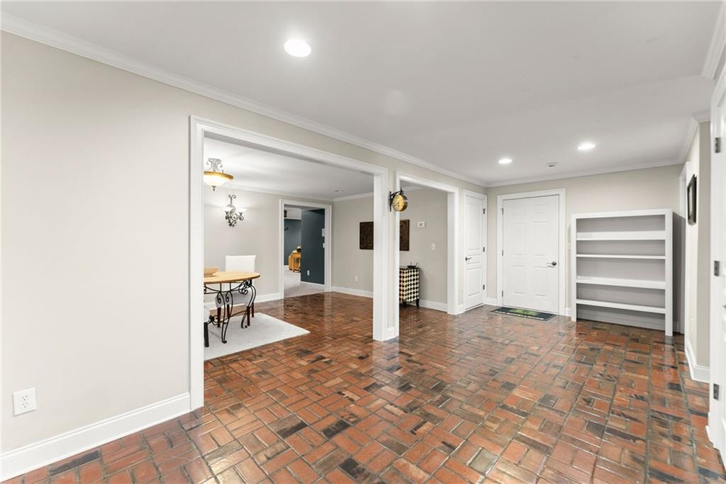 2195 East Maddox Road Buford, GA 30519 - Photo 47 of 100 a view of a hallway to closet and a living room