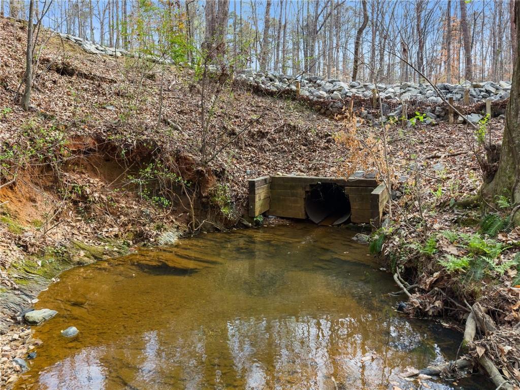 2195 East Maddox Road Buford, GA 30519 - Photo 82 of 100 a view of a yard with an outdoor space