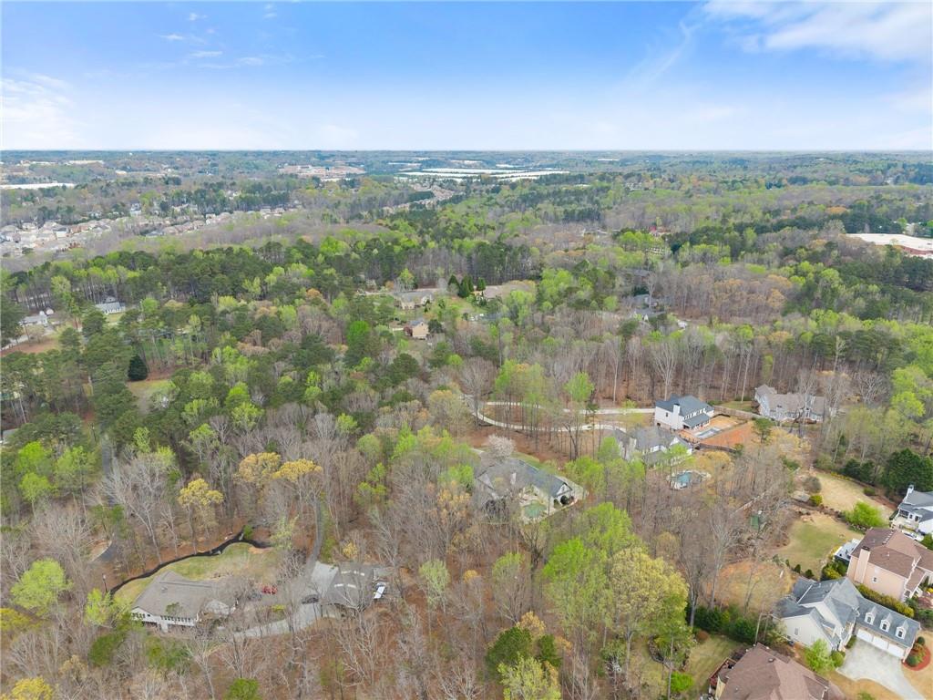 2195 East Maddox Road Buford, GA 30519 - Photo 90 of 100 a view of a lake with mountains in the background