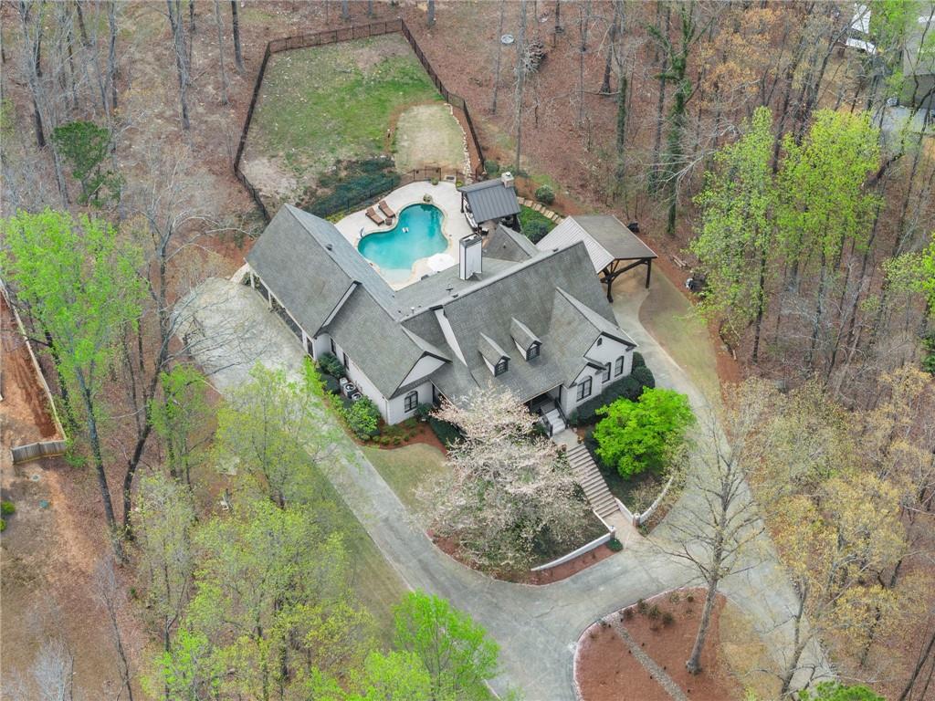 2195 East Maddox Road Buford, GA 30519 - Photo 92 of 100 an aerial view of a house with outdoor space