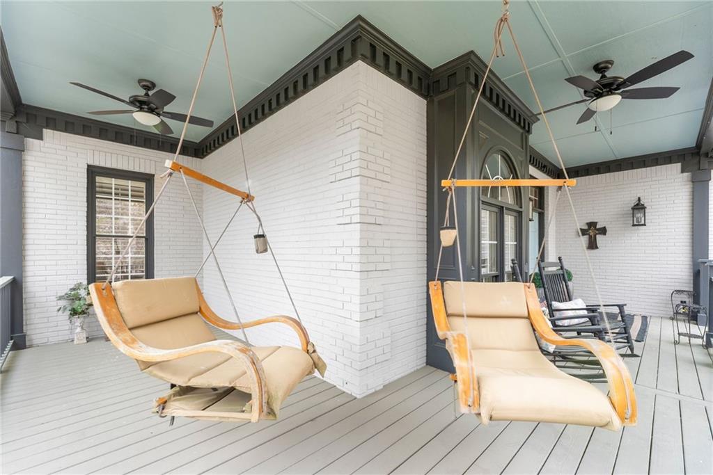 2195 East Maddox Road Buford, GA 30519 - Photo 100 of 100 a view of a chairs and table on the deck