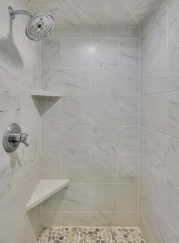 a view of an empty walk in closet