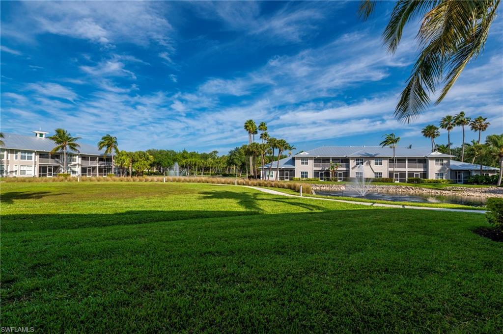 7940 Mahogany Run Lane, Unit 612 Naples, FL 34113 - Photo 1 of 25 a view of building with outdoor space