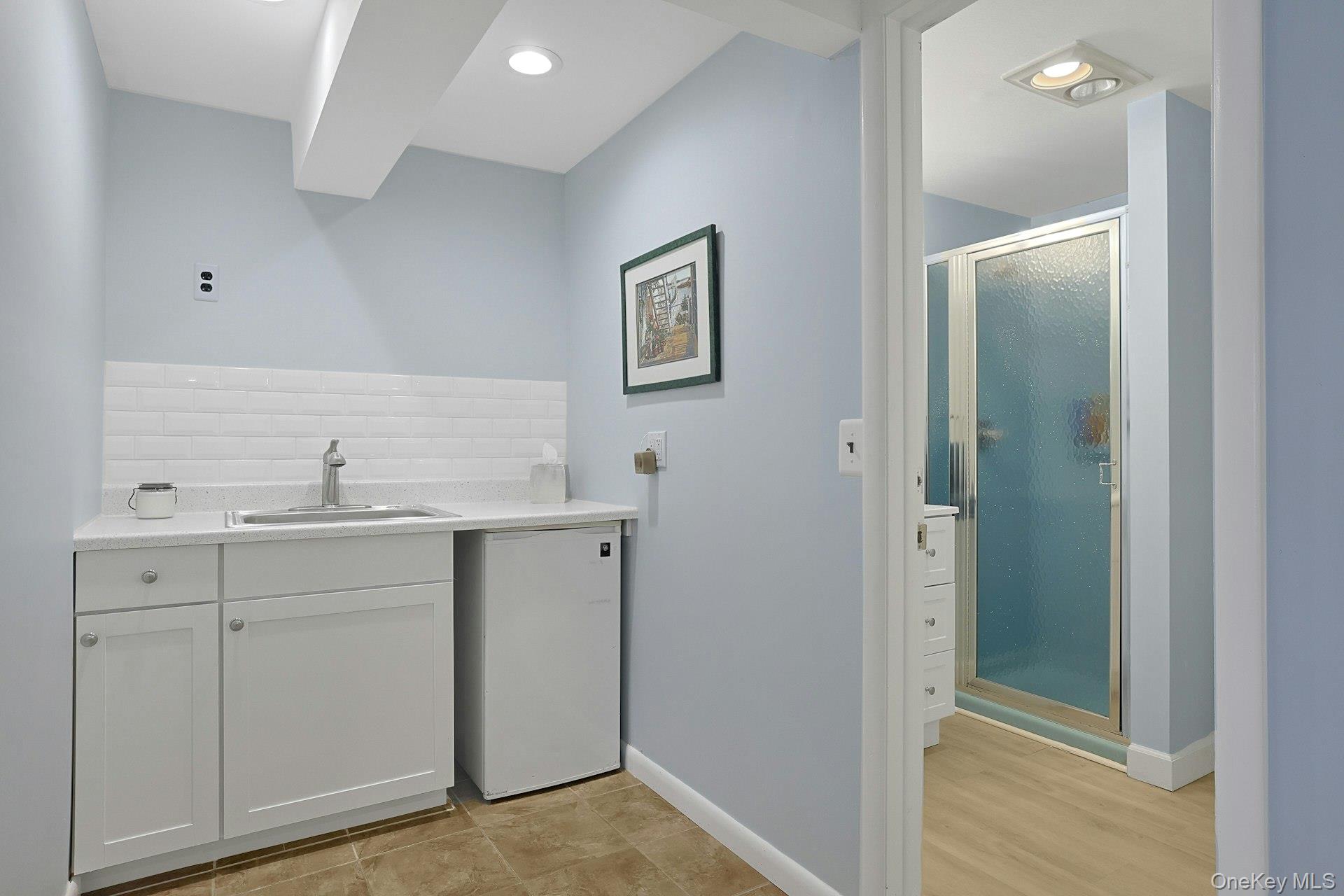 11 Lakeside Road Mahopac, NY 10541 - Photo 31 of 48 A full bathroom just off the family room adds comfort and convenience for everyday living.