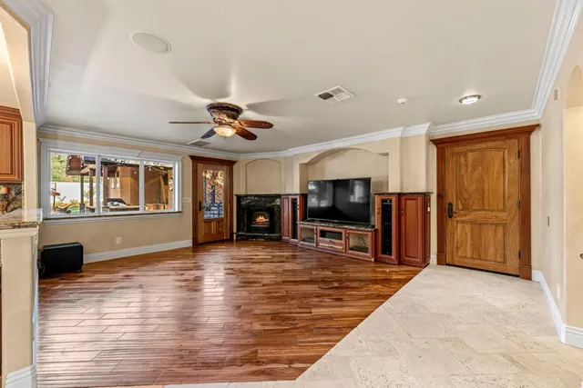 a bathroom with a sink a toilet and a shower curtain