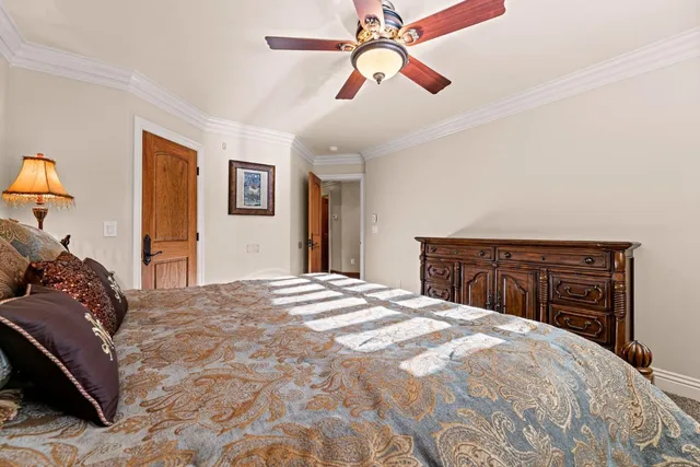 a view of a house with pool and sitting area