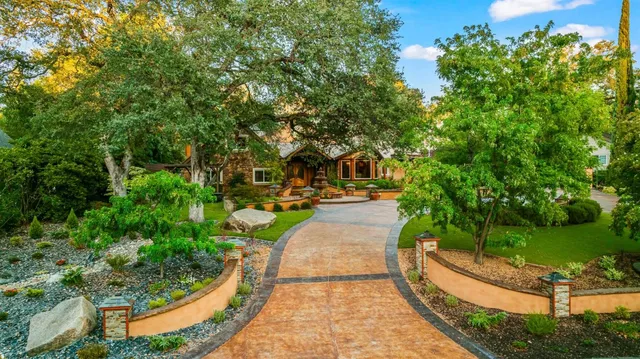 a view of a livingroom with furniture and a window