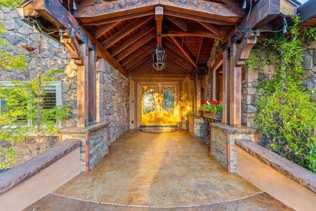 a kitchen with stainless steel appliances granite countertop a stove and a refrigerator