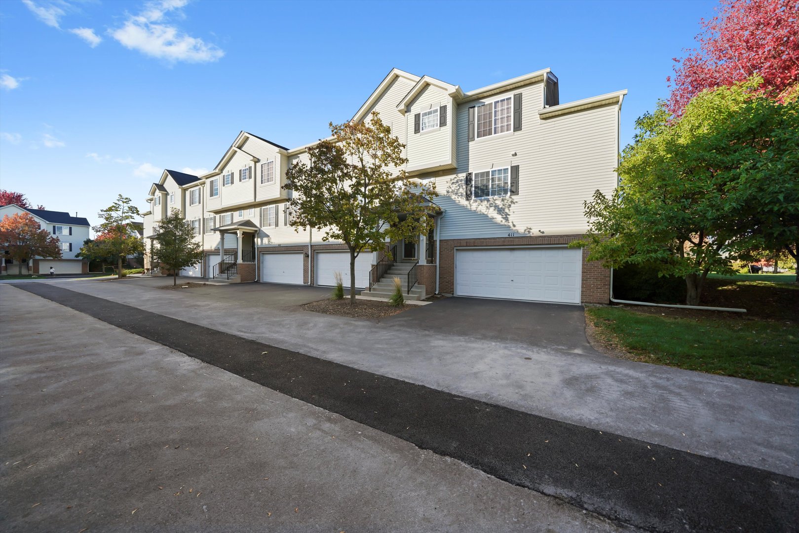 409 Evergreen Circle, Unit 4 Gilberts, IL 60136 - Photo 31 of 42 a view of a house with a street