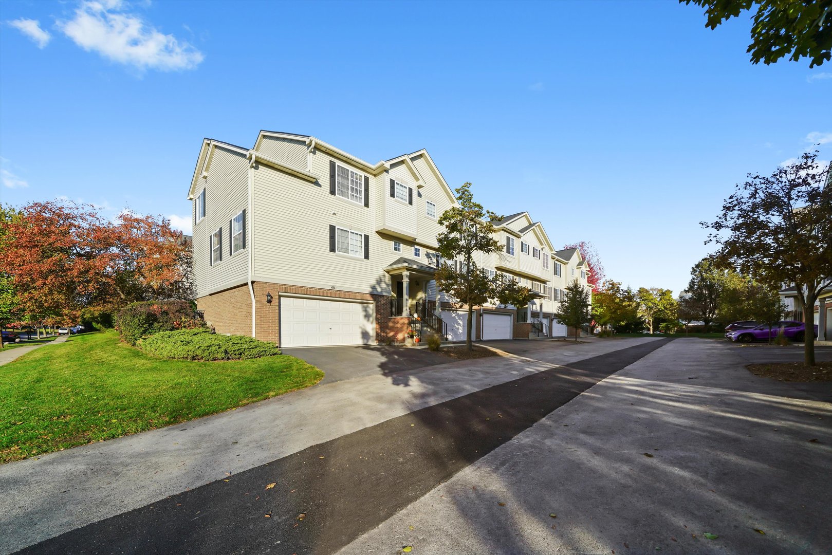 409 Evergreen Circle, Unit 4 Gilberts, IL 60136 - Photo 32 of 42 a view of a white house with a yard