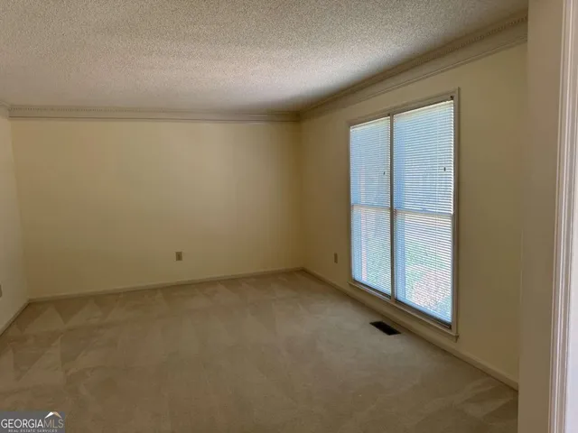 an empty room with sliding door