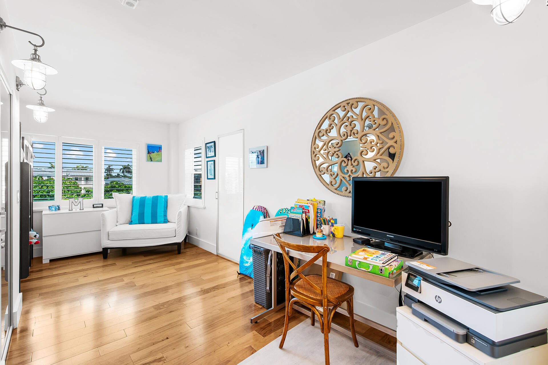 120 North Ocean Boulevard, Unit 202 Delray Beach, FL 33483 - Photo 14 of 32 a living room with furniture and a flat screen tv