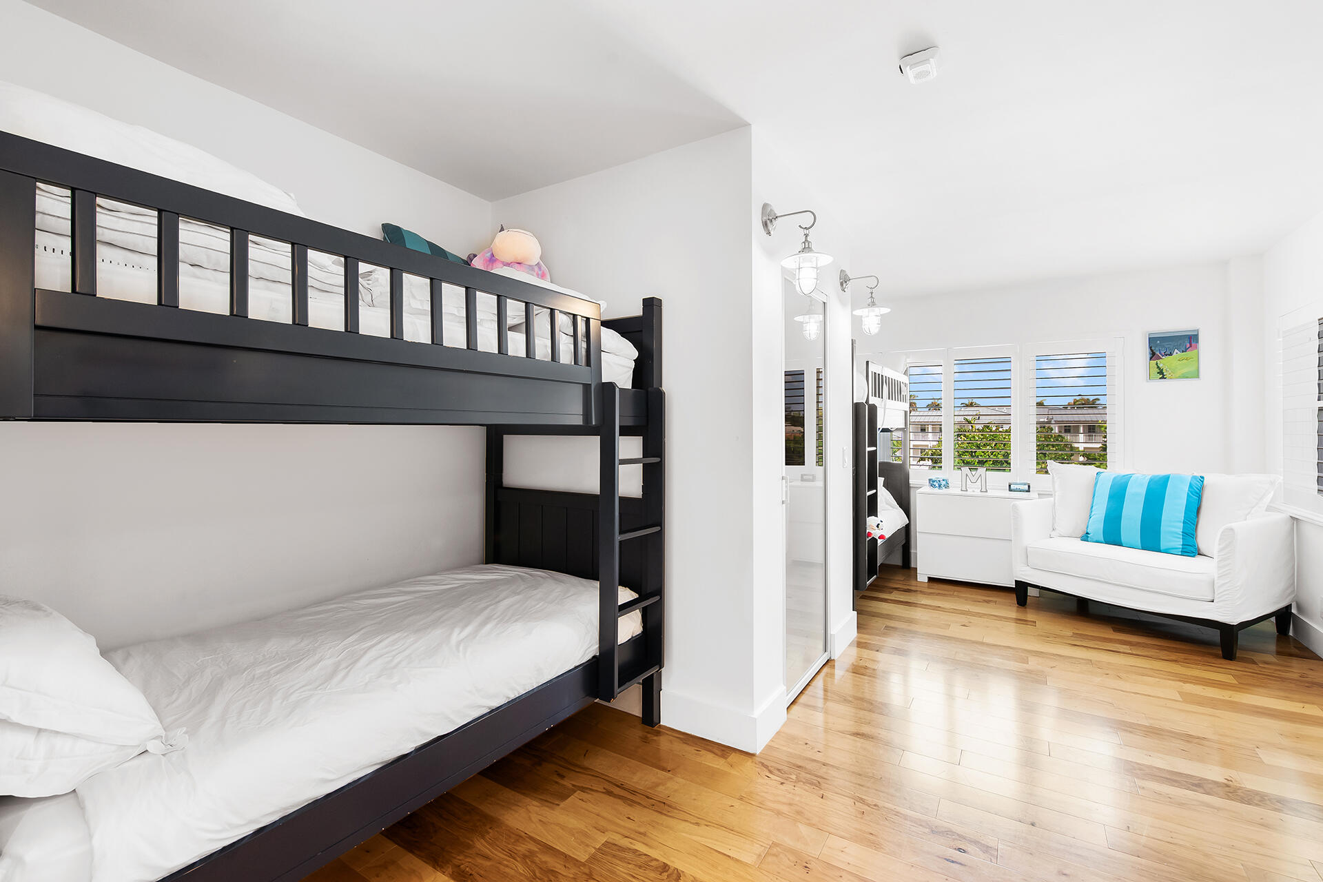 120 North Ocean Boulevard, Unit 202 Delray Beach, FL 33483 - Photo 15 of 32 a bedroom with furniture and wooden floor