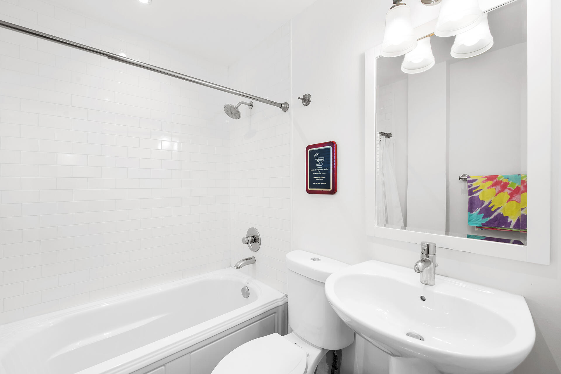 120 North Ocean Boulevard, Unit 202 Delray Beach, FL 33483 - Photo 17 of 32 a bathroom with a sink a toilet and a bathtub