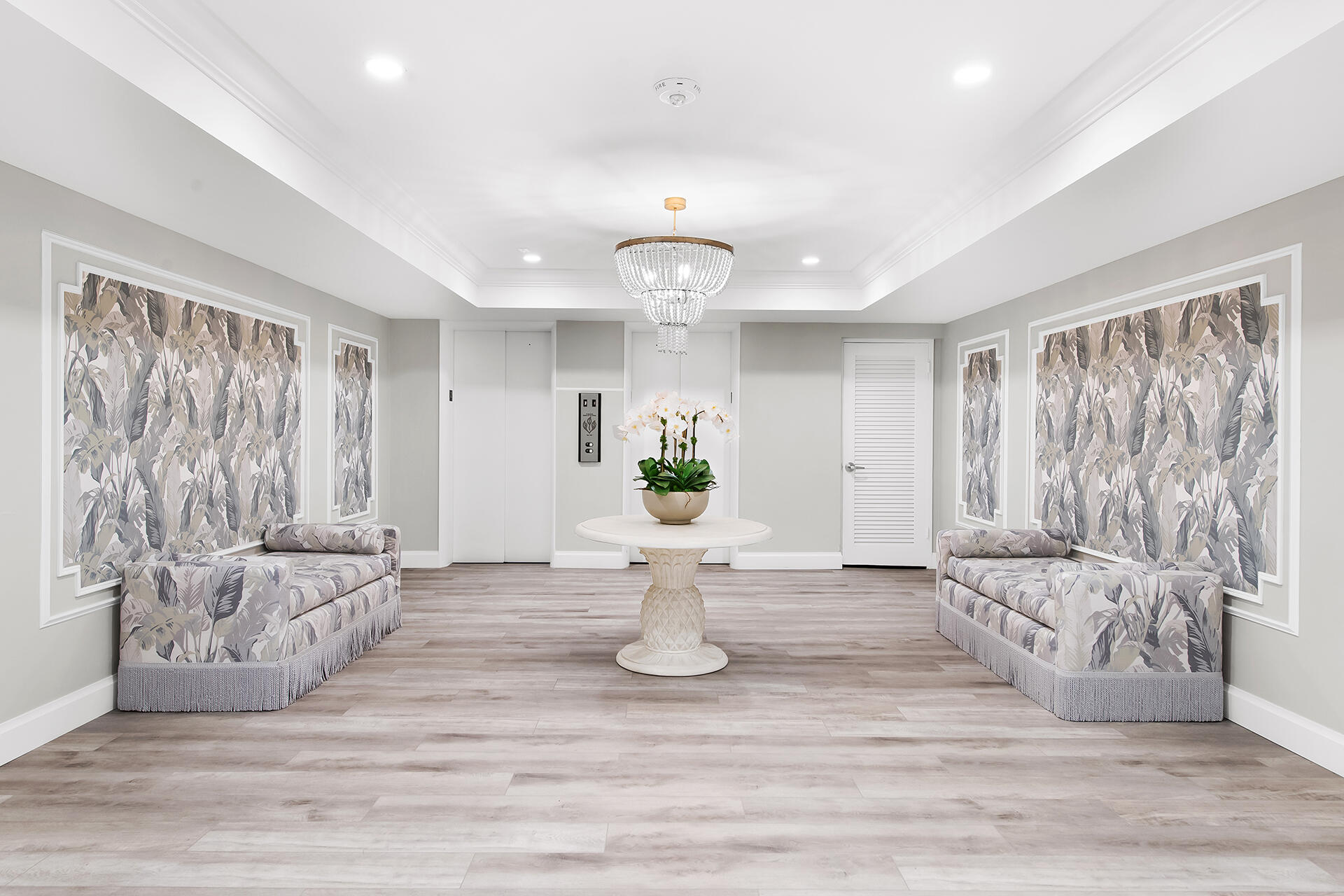 120 North Ocean Boulevard, Unit 202 Delray Beach, FL 33483 - Photo 21 of 32 a view of a living room and a chandelier