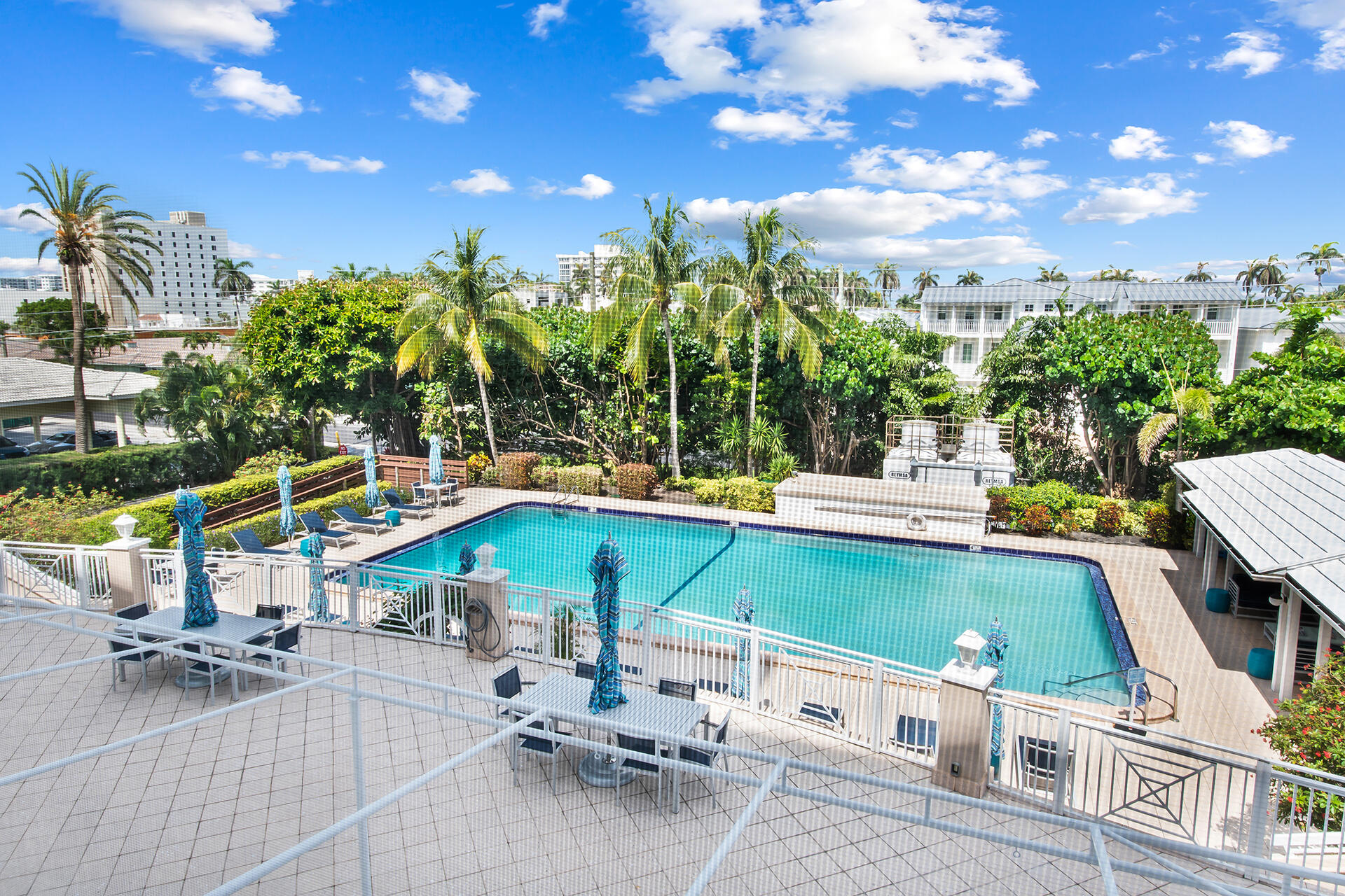 120 North Ocean Boulevard, Unit 202 Delray Beach, FL 33483 - Photo 29 of 32 a view of a patio with swimming pool