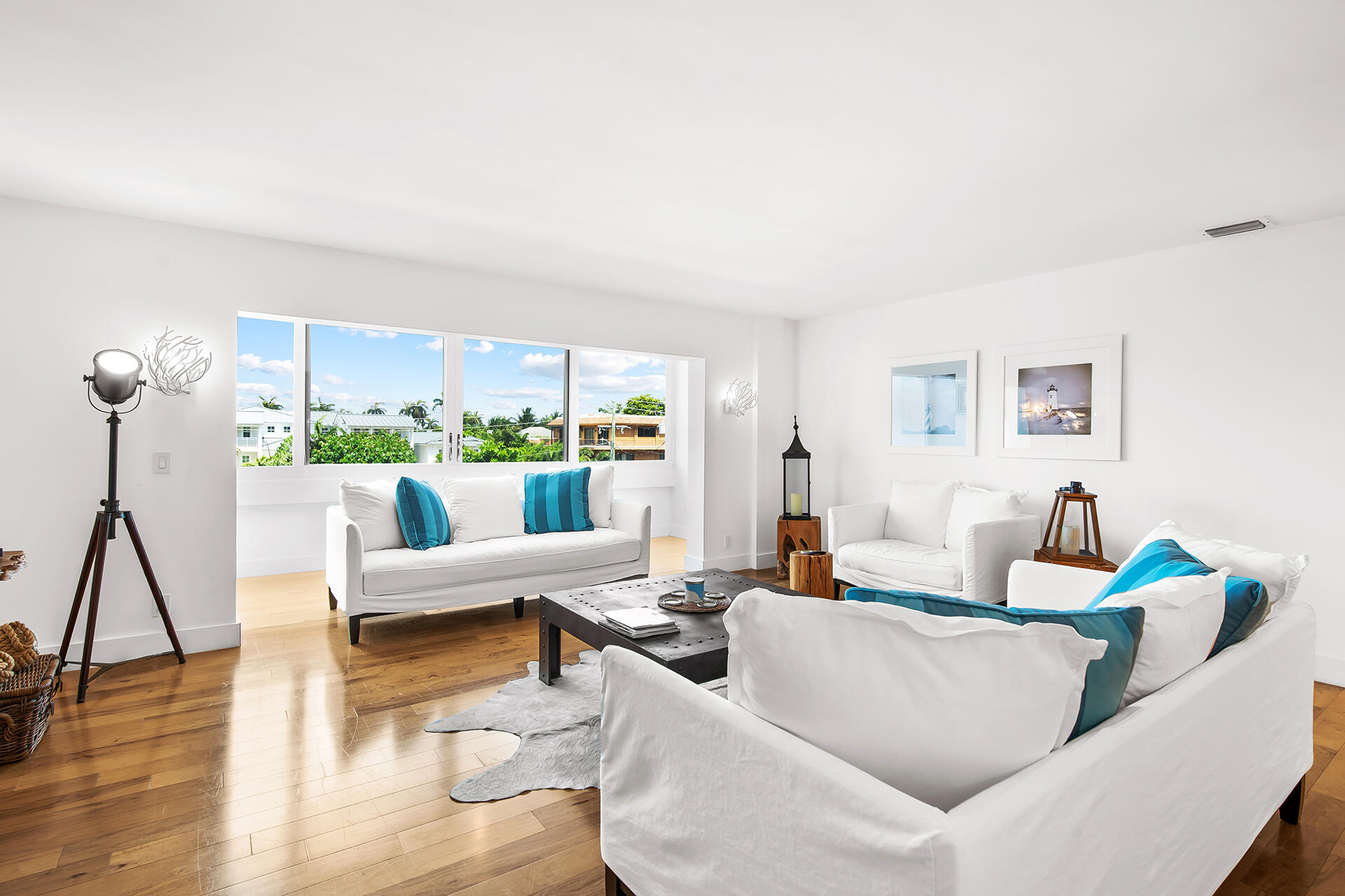 120 North Ocean Boulevard, Unit 202 Delray Beach, FL 33483 - Photo 3 of 32 a living room with furniture and a large window