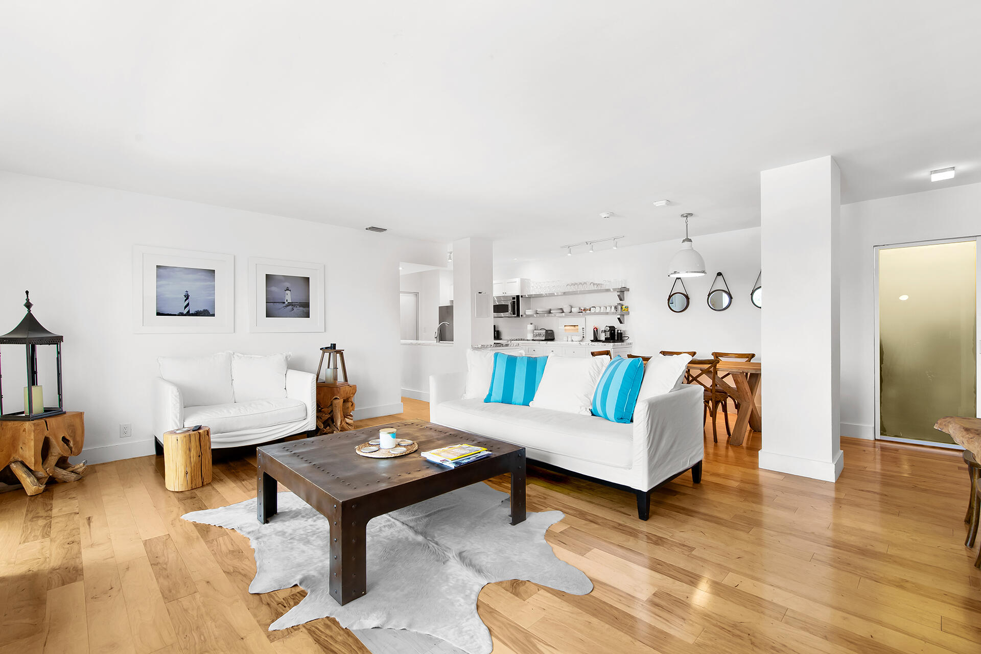 120 North Ocean Boulevard, Unit 202 Delray Beach, FL 33483 - Photo 4 of 32 a living room with furniture and a table