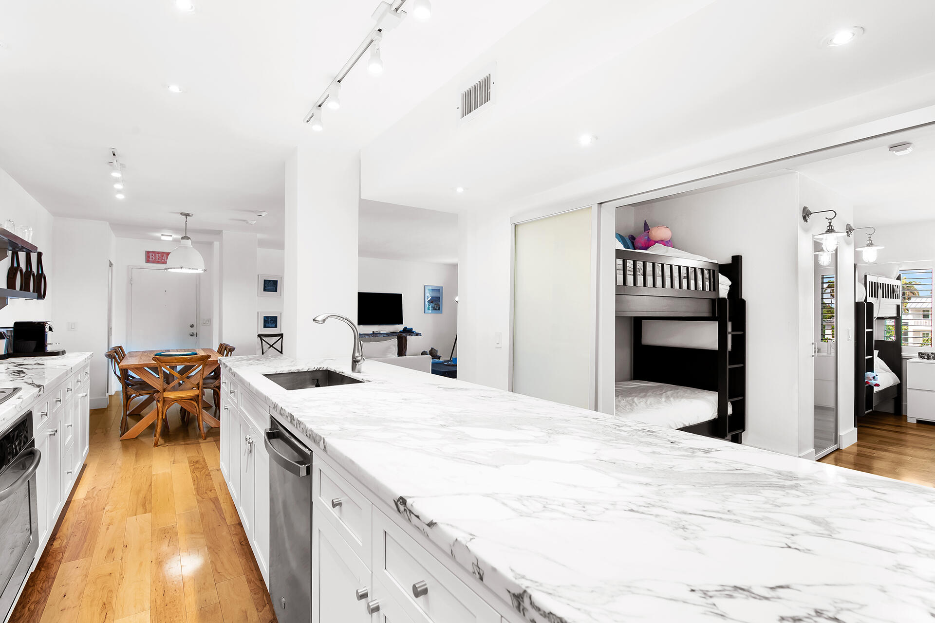 120 North Ocean Boulevard, Unit 202 Delray Beach, FL 33483 - Photo 9 of 32 a very nice looking bedroom with a bed and a table