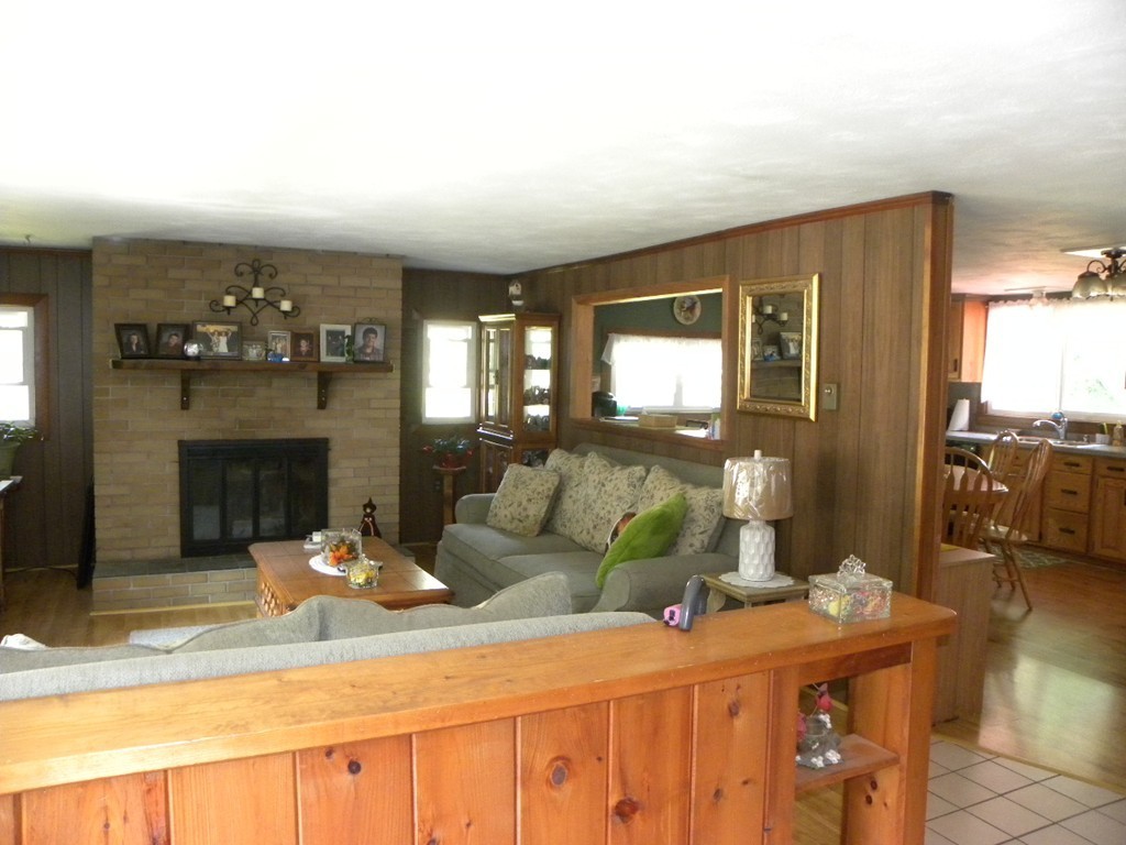 16 Northside Road Charlton, MA 01507 - Photo 7 of 30 a living room with furniture and a fireplace