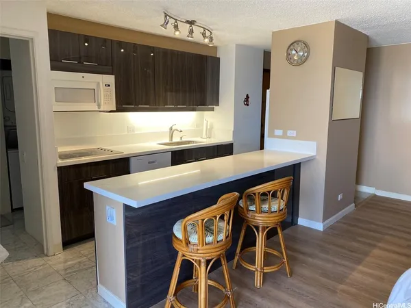 a room with furniture and wooden floor