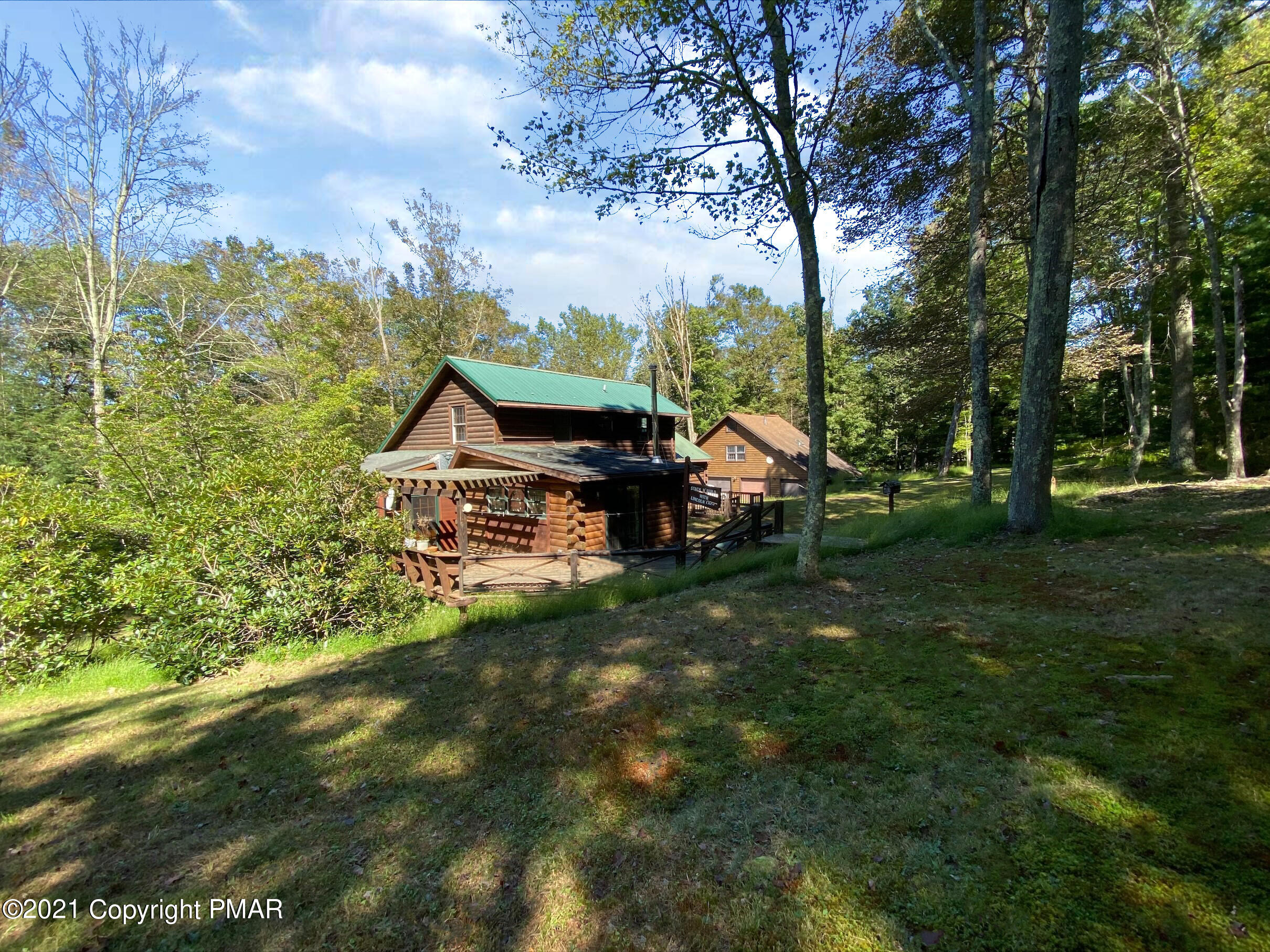 196 Rakich Road Benton, PA 17814 - Photo 4 of 38 a view of house with backyard outdoor seating and green space
