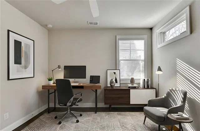 a bathroom with a tub and shower