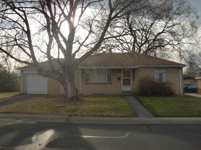 4435 Reed Street Wheat Ridge, CO 80033 - Photo 1 of 1 a view of a yard in front of a house