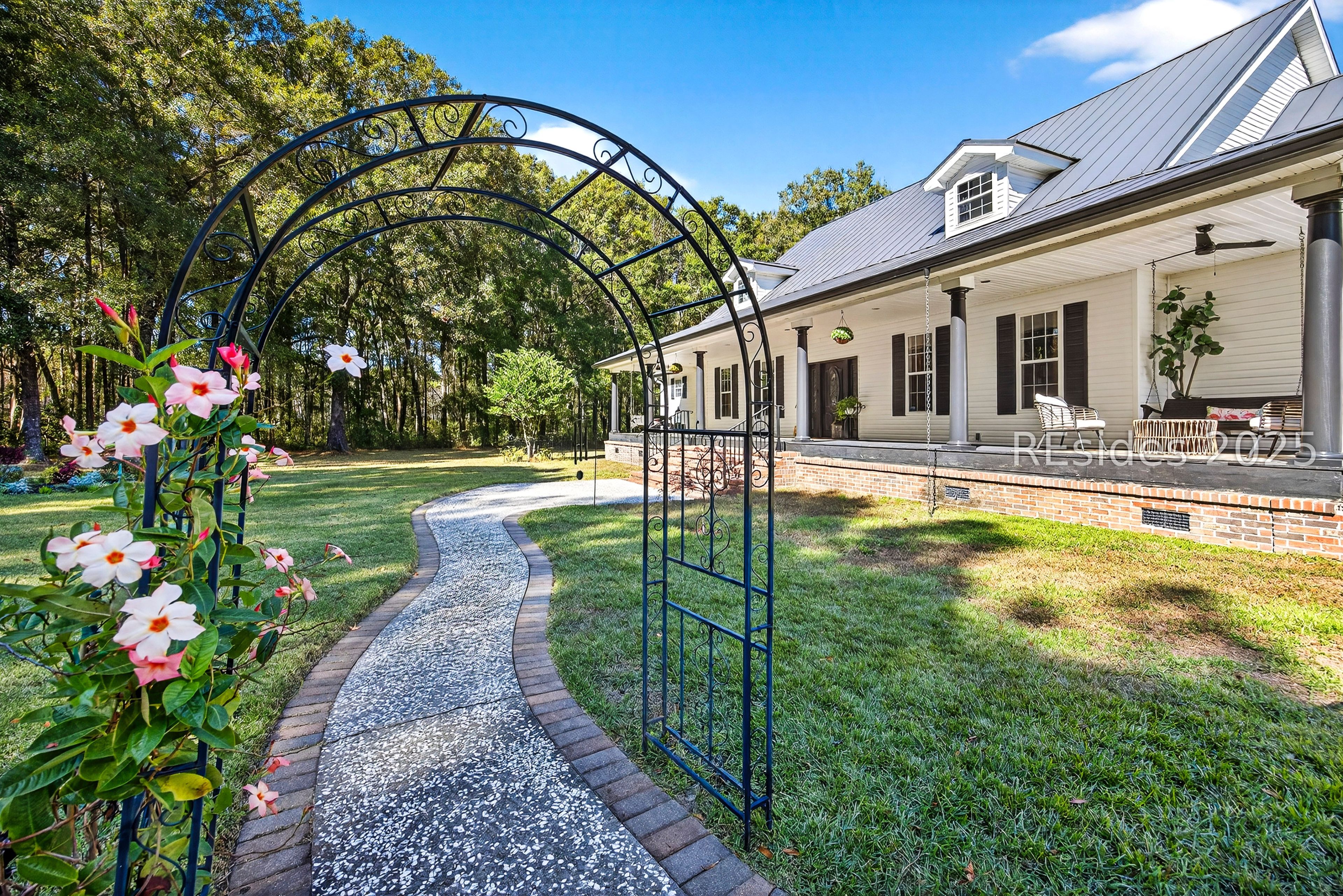 73 School Cut Road Hardeeville, SC 29927 - Photo 11 of 86 Walk way to front of home
