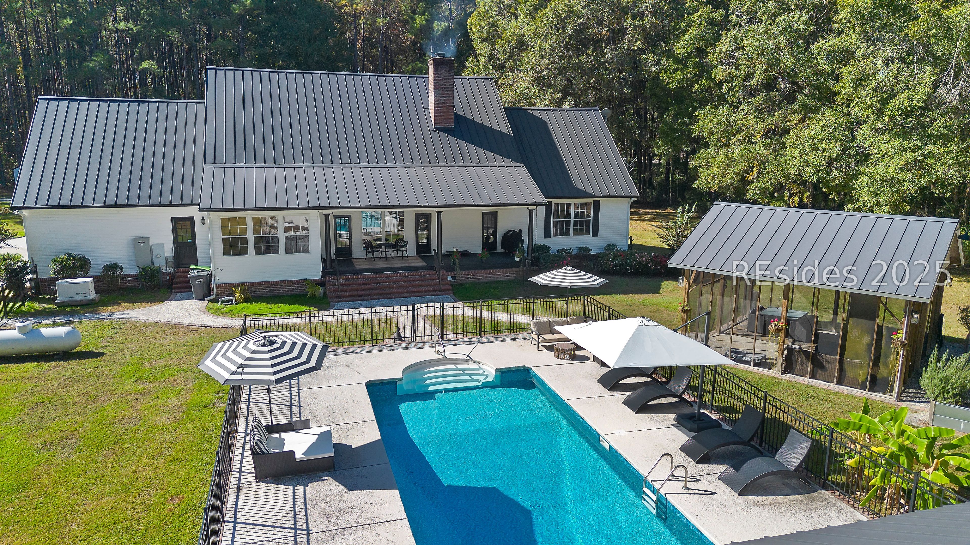 73 School Cut Road Hardeeville, SC 29927 - Photo 4 of 86 Pool and screened pavilion in backyard