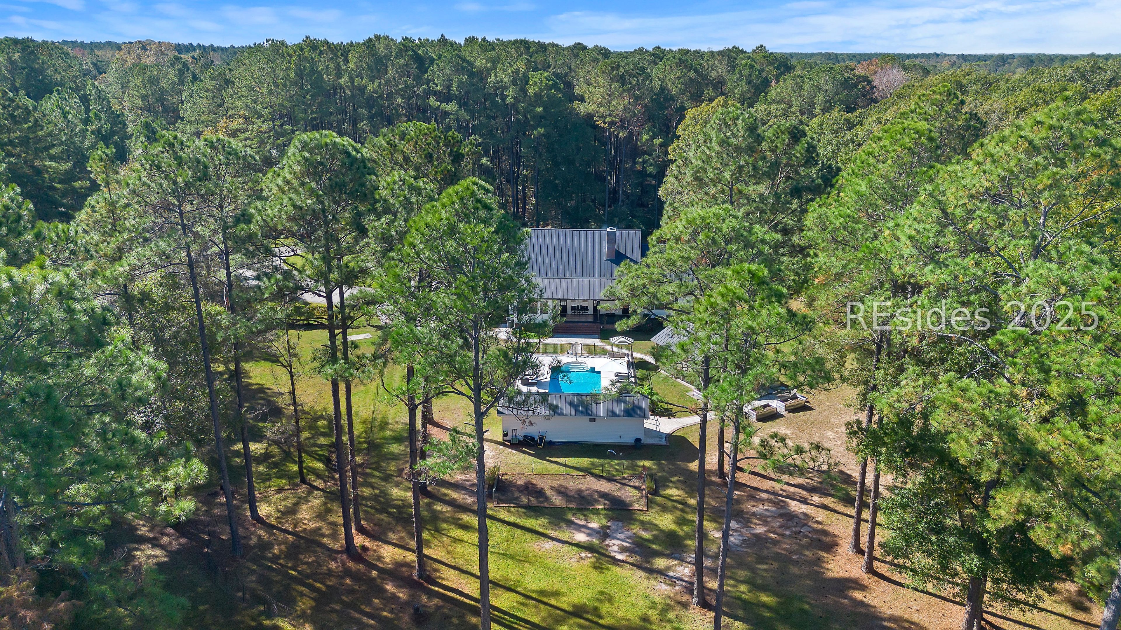 73 School Cut Road Hardeeville, SC 29927 - Photo 81 of 86 Drone Shot of Rear of Home, Pool House, and Pool