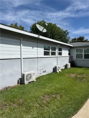 a view of a backyard with a garden